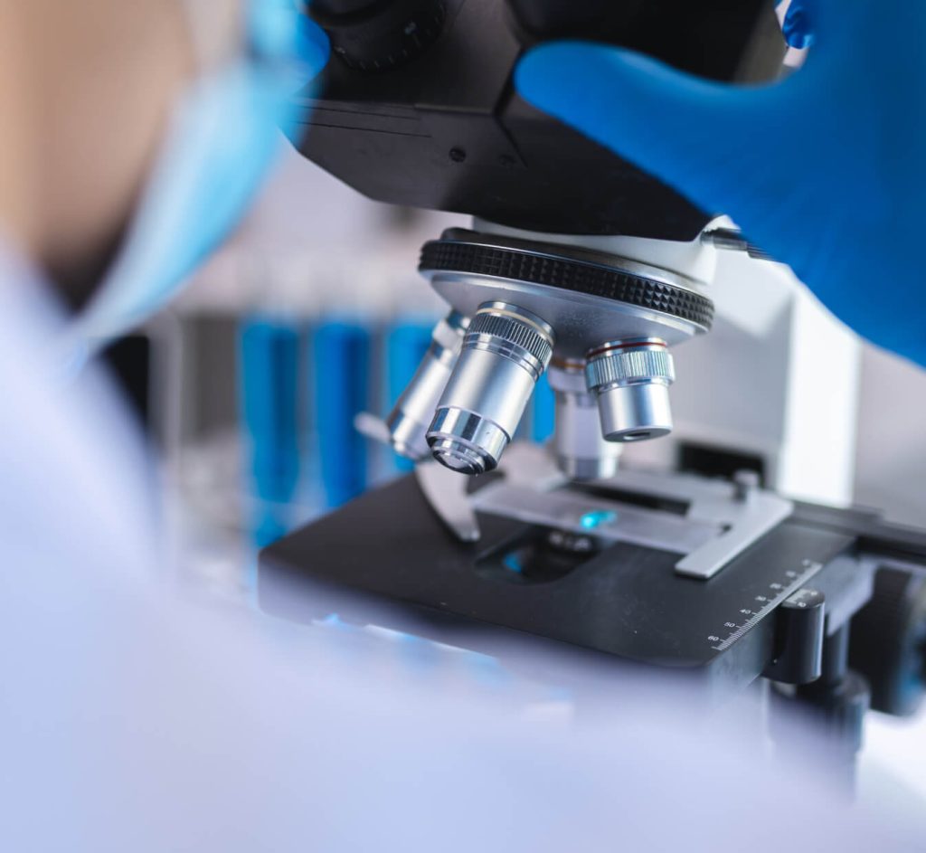 Microscope and laboratory research vials